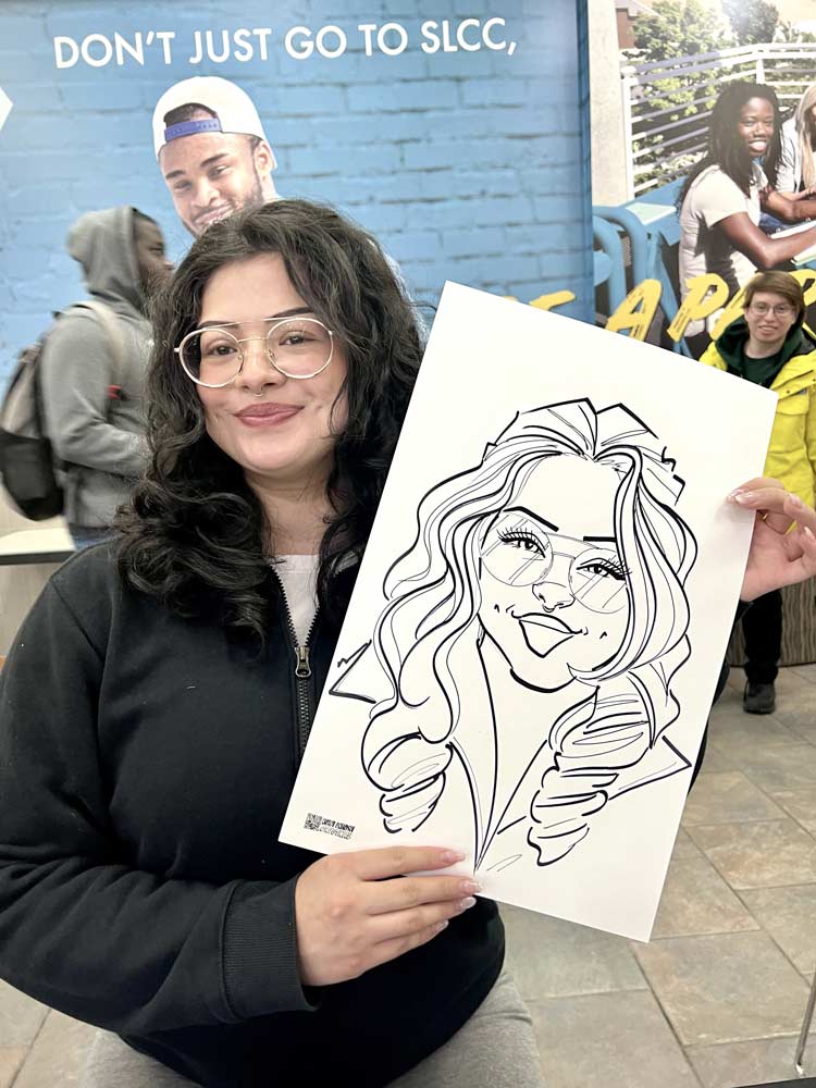 Caricature artist drawing guests at a Park City Utah event