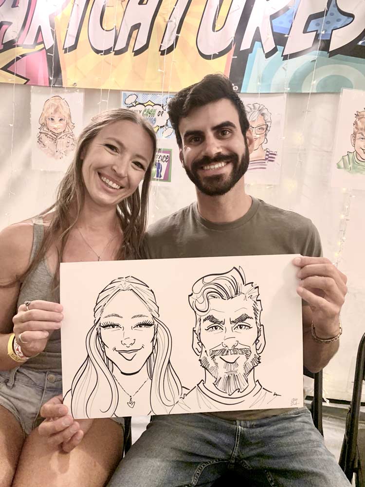 Caricature artist drawing guests at a party in Salt Lake City