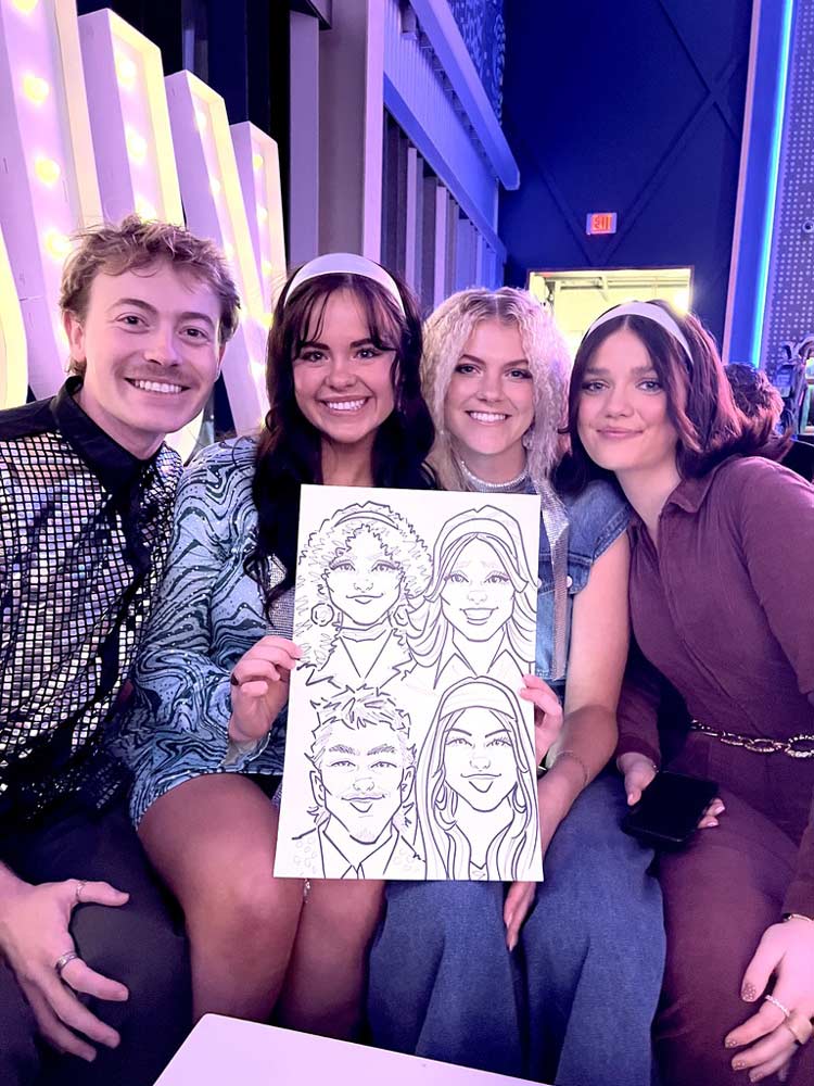 Wedding guests receiving caricatures at Utah wedding event