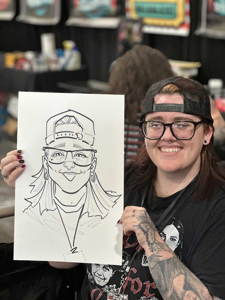 Family enjoying caricatures at festival event