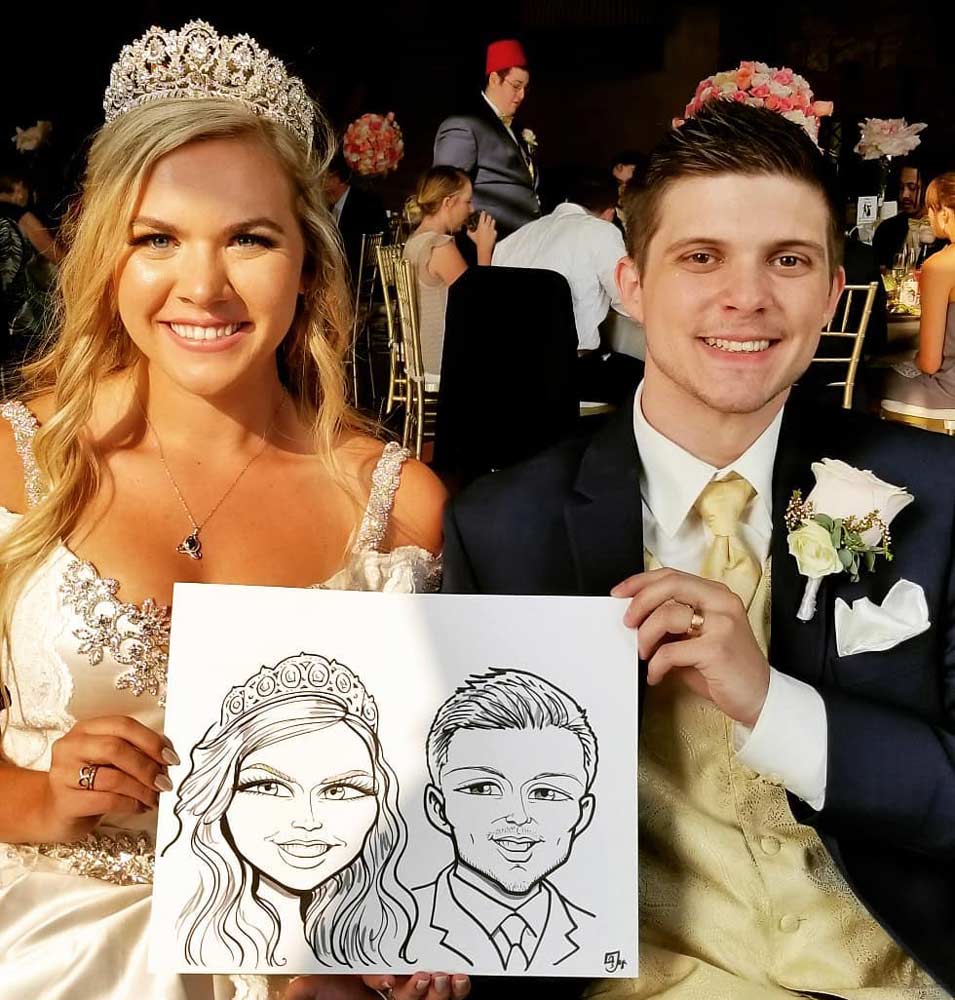 Wedding caricature artist in Utah drawing guests at reception