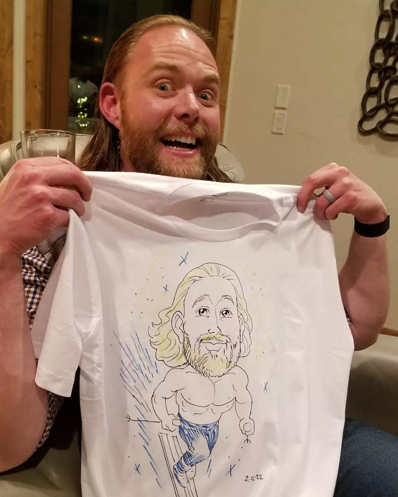 Guests enjoying caricatures at a private party event