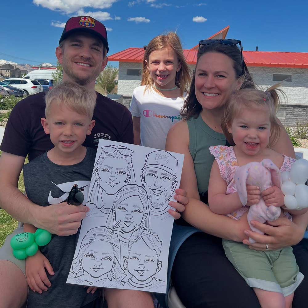 Caricature artist drawing guests at Utah celebration