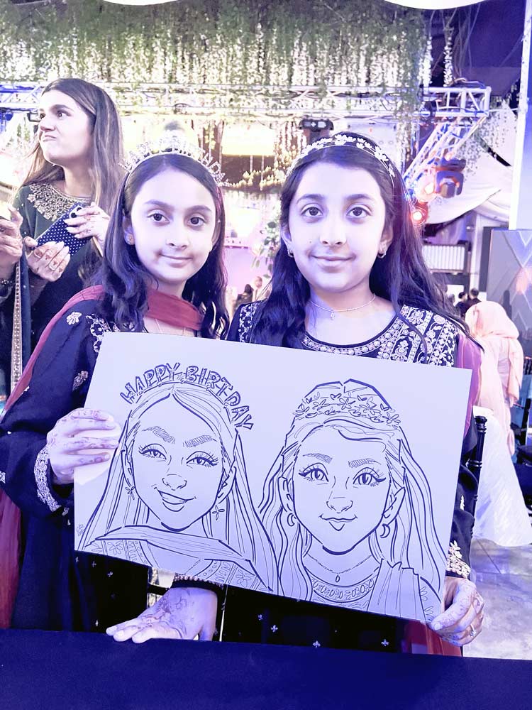 Live caricature artist drawing guests at a wedding reception in Salt Lake City